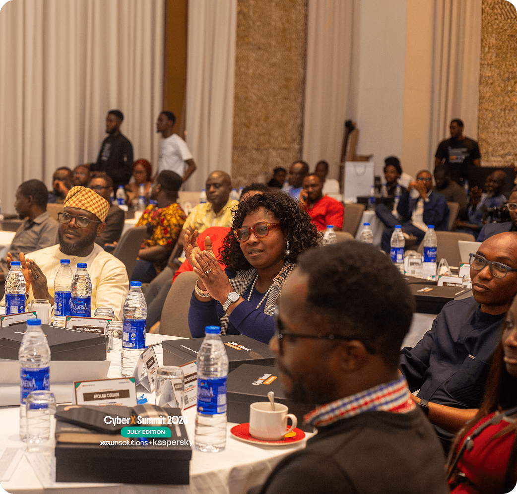 Executives seated at tables during a DigitalX session