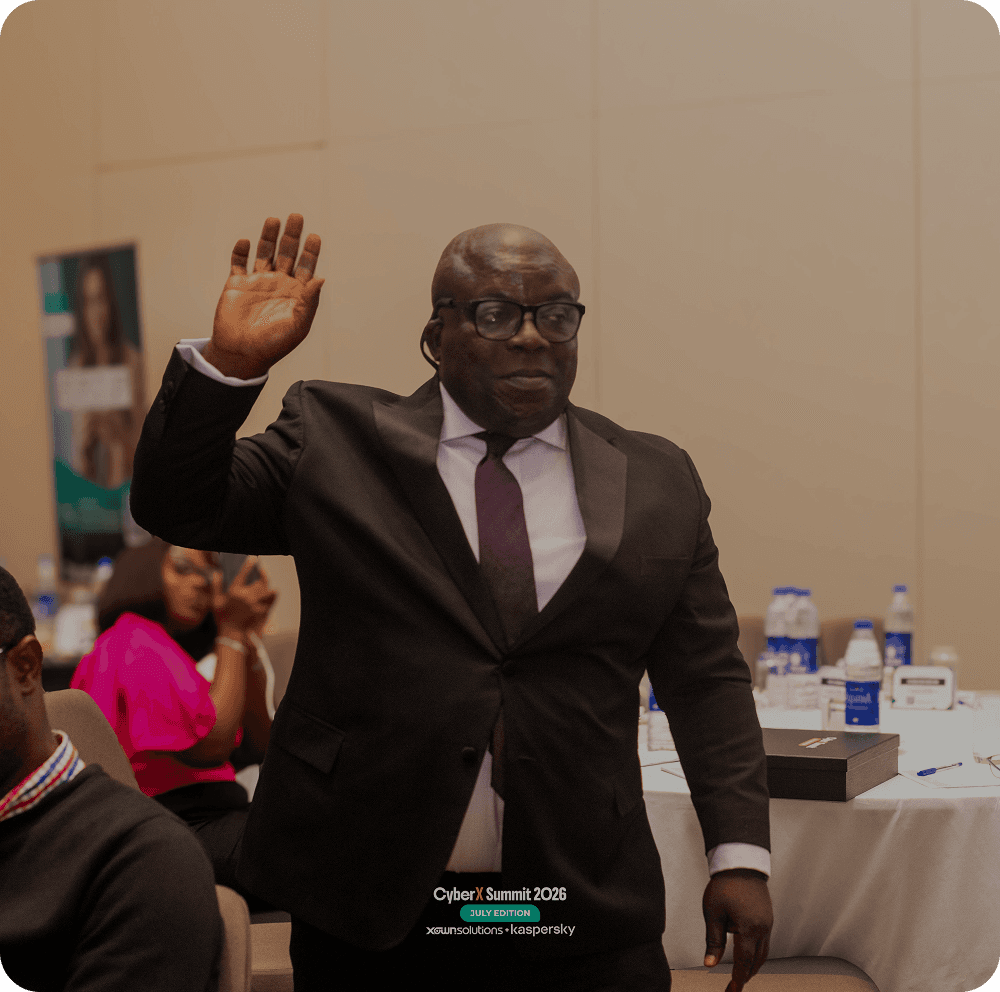 Executive raising a hand during a DigitalX session